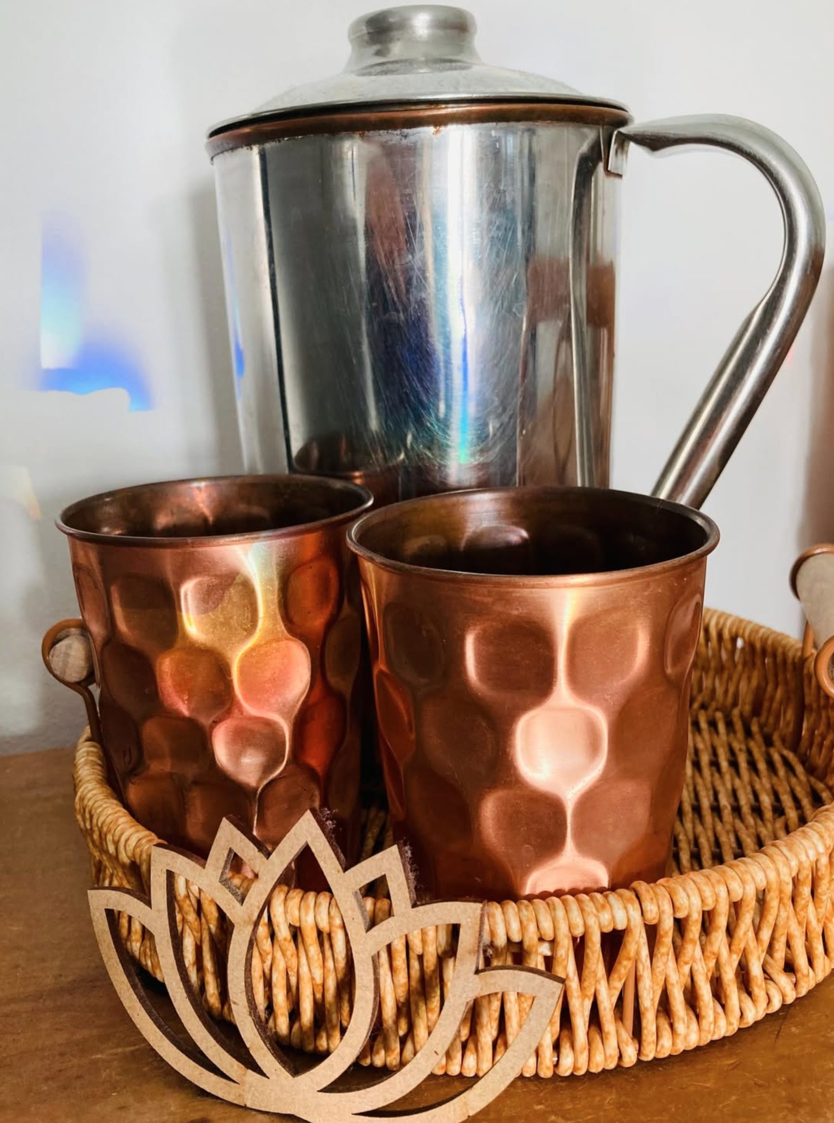 Copper cups and lotus detail in the Soul Peace Holistic Healing treatment room